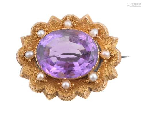 A Victorian amethyst and half pearl brooch