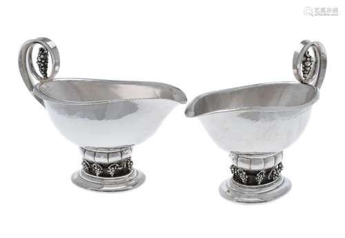 Georg Jensen, a pair of Danish silver Grape pattern sauce or gravy boats