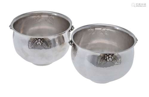 Georg Jensen, a pair of Danish silver Grape pattern bowls