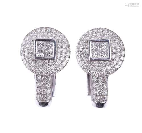 A pair of diamond earrings