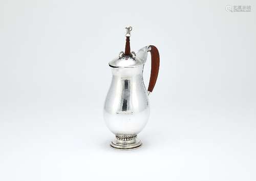 ϒ Georg Jensen, a Danish silver baluster chocolate pot or pitcher