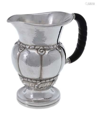 ϒ Georg Jensen, a Danish silver water jug or pitcher