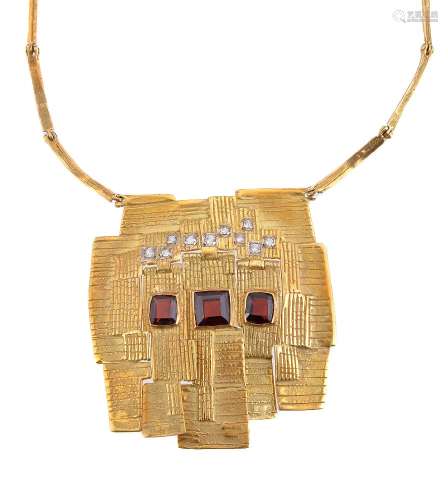 A 1970s 18 carat gold abstract pendant