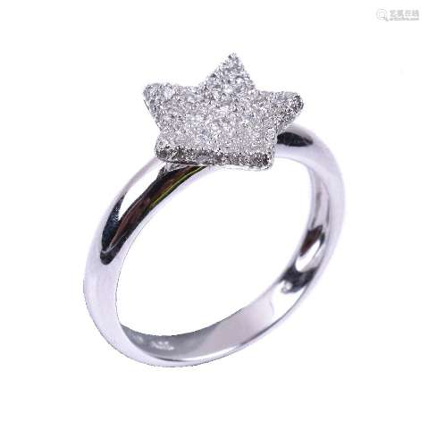 A diamond star dress ring