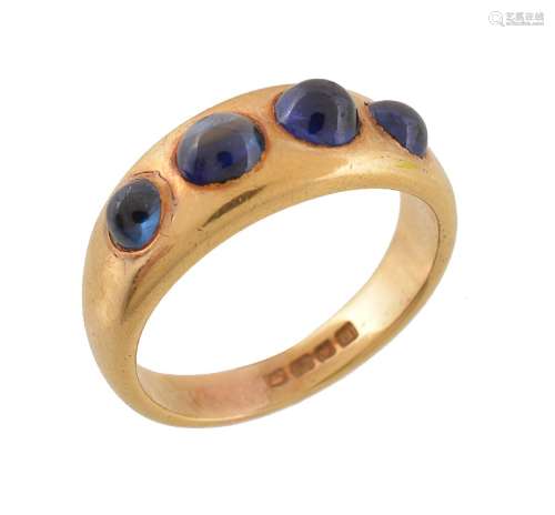 A cabochon sapphire four stone ring