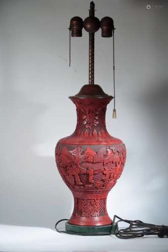 A RED LACQURE CARVED VASE LAMP