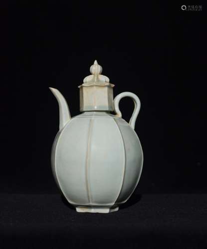 A CELADON WINE POT AND COVER