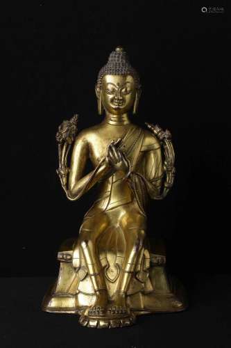 A GILT-BRONZE FIGURE OF BUDDHA