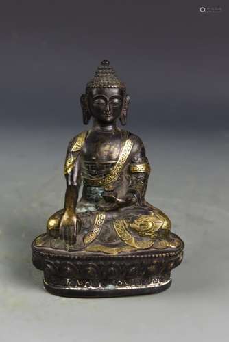 A GILT-BRONZE FIGURE OF SHAKYAMUNI