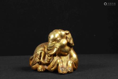 A GILT-BRONZE ELEPHANT-FORM PAPER WEIGHT