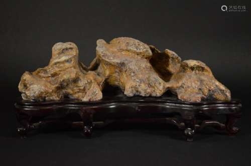 A TAIHU SCHOLAR ROCK WITH WOOD STAND
