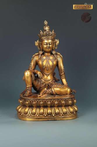 A GILT-BRONZE FIGURE OF TARA