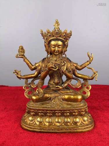 A GILT-BRONZE FIGURE OF USHNISHAVJAYA