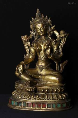 A GILT-BRONZE FIGURE OF TARA