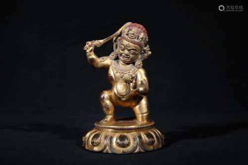 A GILT-BRONZE FIGURE OF BUDDHA