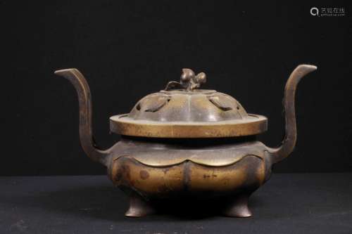 A BRONZE TRIPOD CENSER AND COVER