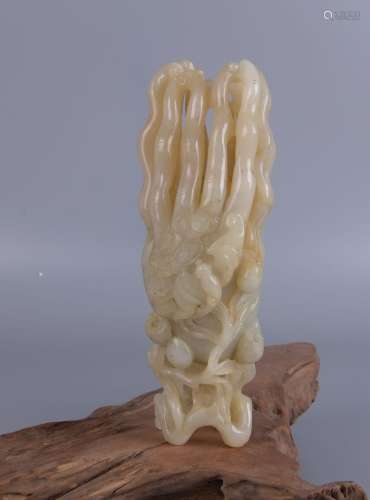 A WHITE JADE CARVING OF BUDDHA`S HAND
