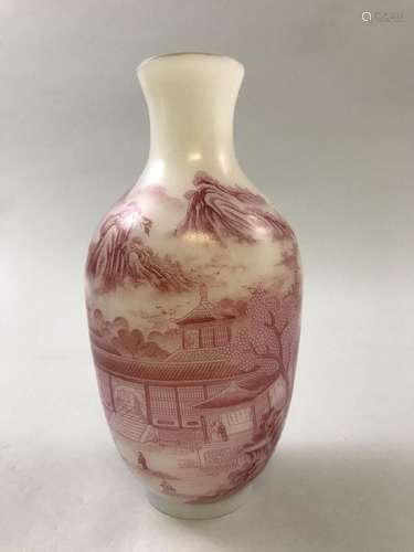 A RED AND WHITE VASE