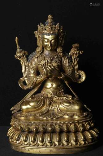 A GILT-BRONZE FIGURE OF BODHISATTVA