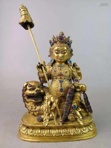 A GILT-BRONZE FIGURE OF ACHALA