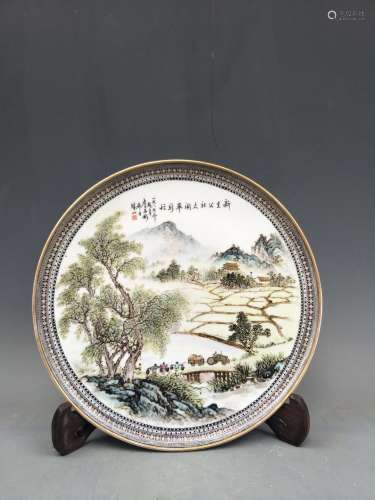 A FAMILLE ROSE LANDSCAPE DECORATED DISH