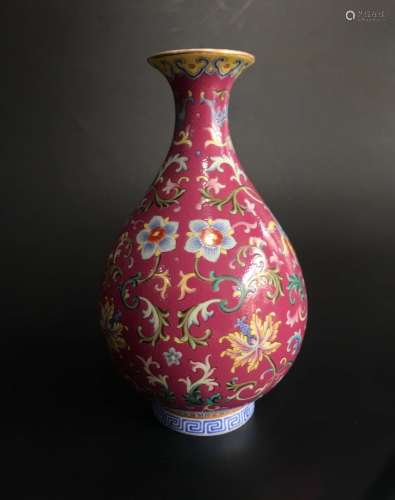 A RED-GROUND FAMILLE ROSE YUHUCHUN VASE, QIANLONG