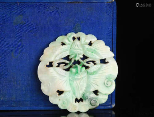 A JADEITE CARVED CIRCLE BUTTERFLY SHAPED PENDANT