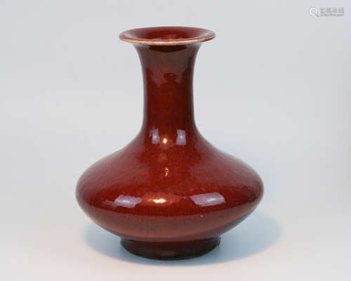 A RED GLAZE BOTTLE VASE