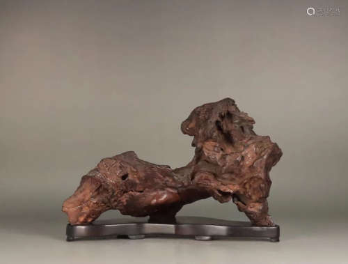 A HUANGHUALI WOOD MOUNTAIN SHAPED PEN HOLDER