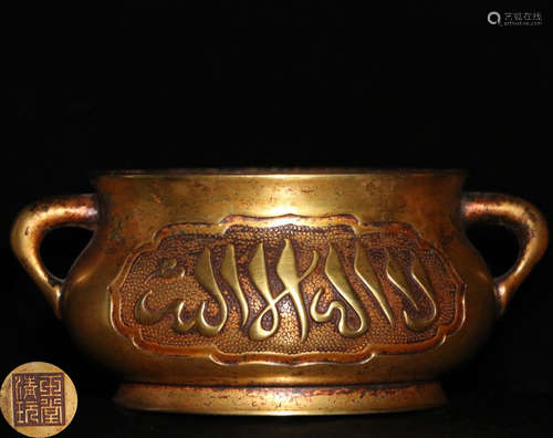 A GILT COPPER DOUBLE-EAR CENSER