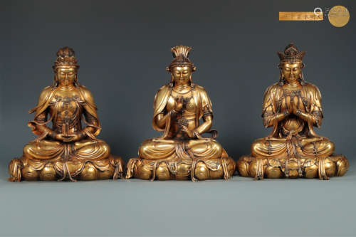 THREE GILT BRONZE SITTING BUDDHA STATUES
