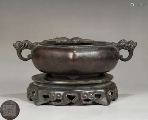 A DOUBLE-EAR COPPER CENSER