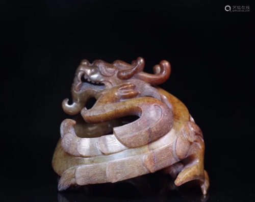 A JADE CARVED DRAGON SHAPED PENDANT
