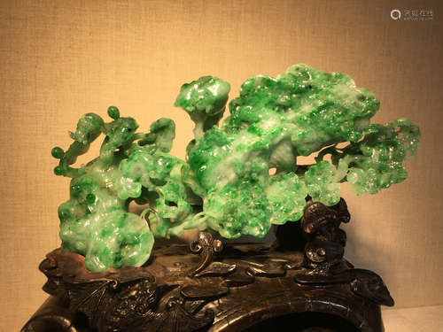 A RUYI SHAPED JADEITE ORNAMENT