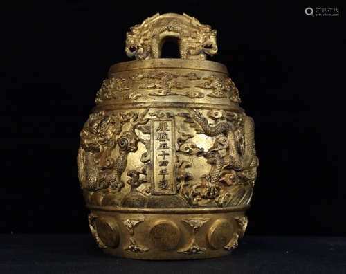 A GILT DRAGON DESIGN BELL SHAPED ORNAMENT