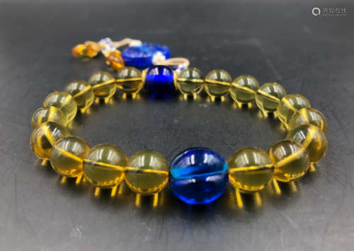 A MEXICAN BLUE AMBER BEADS BRACELET