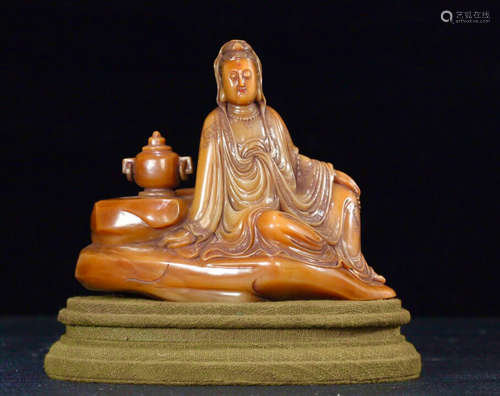 A SOAPSTONE CARVED TIANHUANG GUANYIN FIGURE