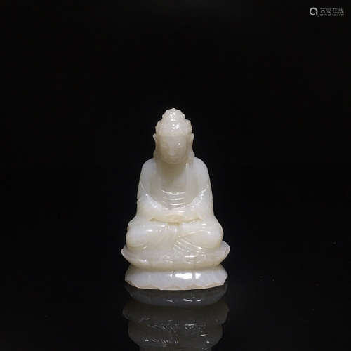 A WHITE JADE CARVED SHAKYAMUNI BUDDHA