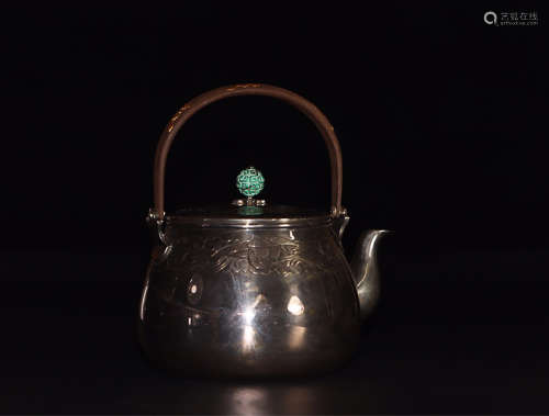 A CRANE PATTERN SILVER TEAPOT