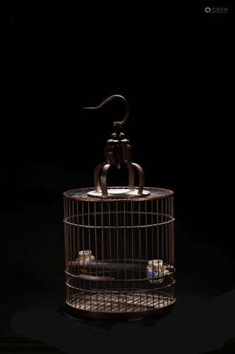 AN OLD YELLOW PEAR WOOD BIRDCAGE