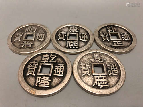 A SET OF SILVER COINS