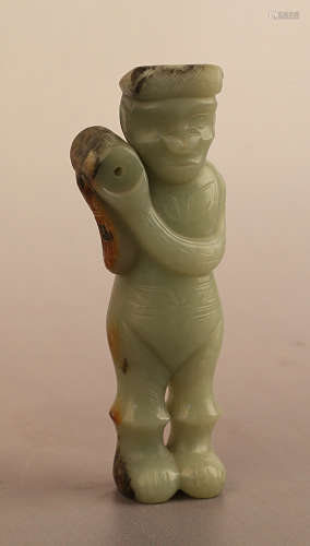 16TH CENTURY BC, A TRADITIONAL MAN DESIGN HETIAN JADE FIGURE, SHANG DYNASTY