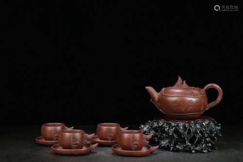 A FLORAL AND VERSE PATTERN CLAY TEAPOT SET
