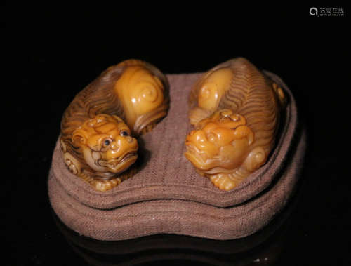 17-19TH CENTURY, A PAIR OF AUSPICIOUS ANIMAL DESIGN FIELD YELLOW STONE, QING DYNASTY
