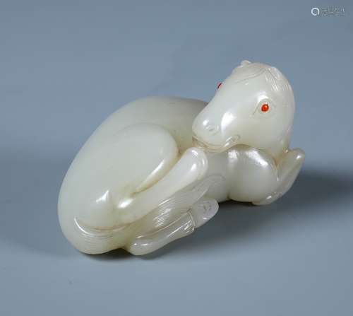 AN EXQUISITE AND VERY RARE WHITE JADE HORSE