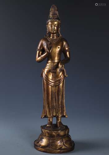 A RARE AND FINELY CAST GILT-BRONZE FIGURE OF ACUOYE