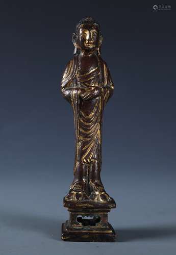 A EARLY GILT BRONZE STAND SAKYAMUNI