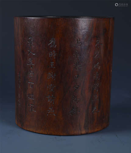 AN INSCRIBED CYLINDRICAL HUANGHUALI BRUSH POT