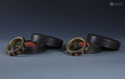 A PAIR OF CHINESE ALOESWOOD CHEN XIANG BRACELETS IN