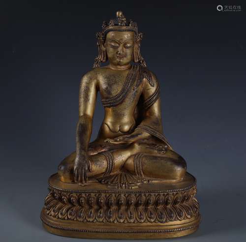 A RARE CAST GILT BRONZE FIGURE OF CROWNED SHAKYAMUNI